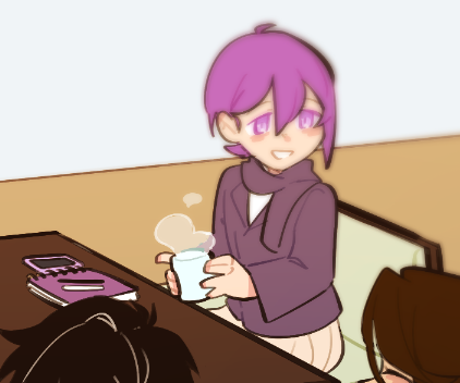 Vino holding a hot mug and smiling.