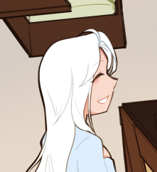 A profile of Ari smiling.